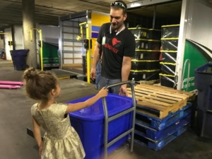 Calinn's daughter, Serenity, working with Dave to unload