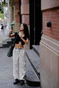 VantagePoint Marketing - woman recording with phone on sidewalk