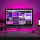 Fuchsia backdrop-website design images on laptop