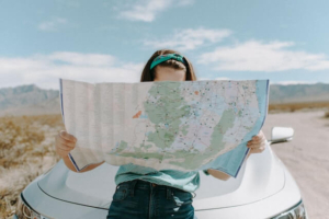 website design -woman with map finding directions