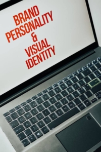 laptop with saying "Brand personality and viual identity